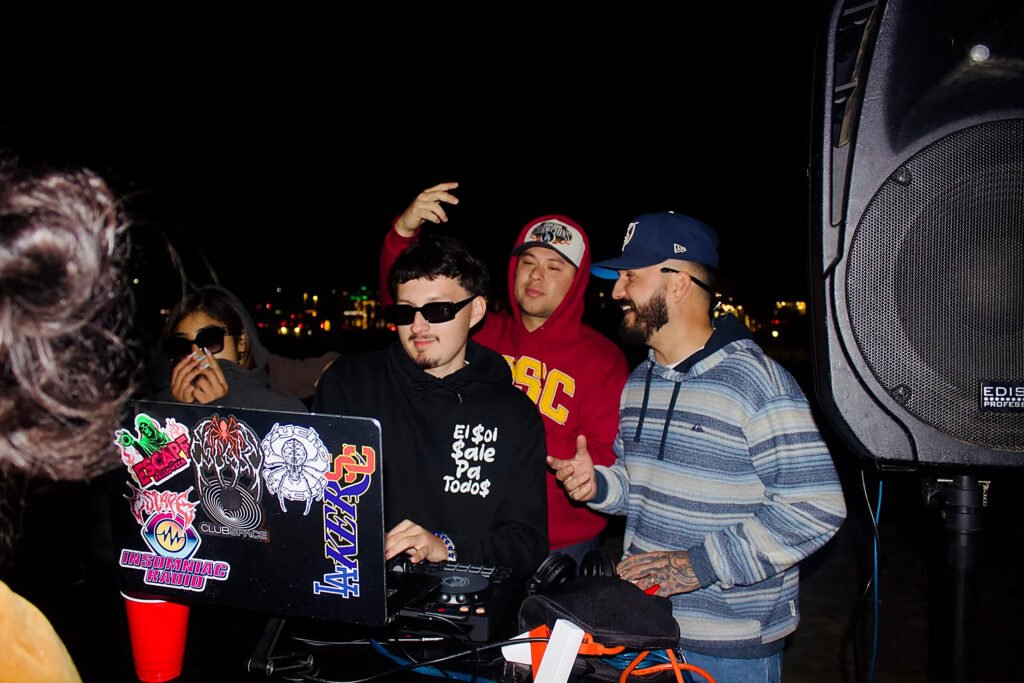 Niko playing a night set with the crowd close to the decks